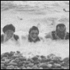 Nicholas, his sister Olga, Tatiana and Anastasia in the water, summer 1913